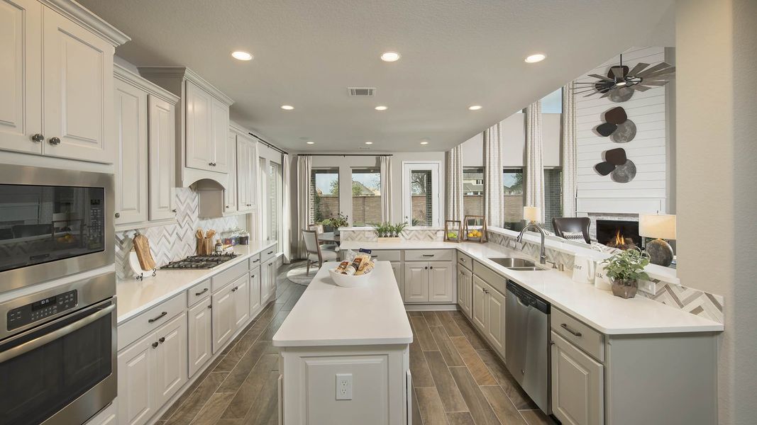 Furnished interior view inside a new home in Bridgeland, Cypress (Image 33).