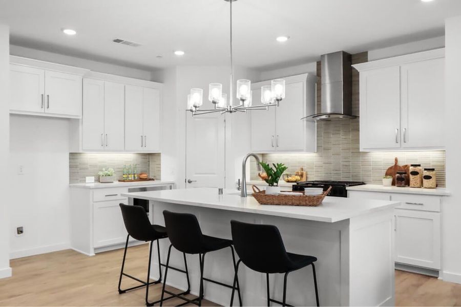 Furnished interior view inside a new home in The Tribute, The Colony (Image 4).