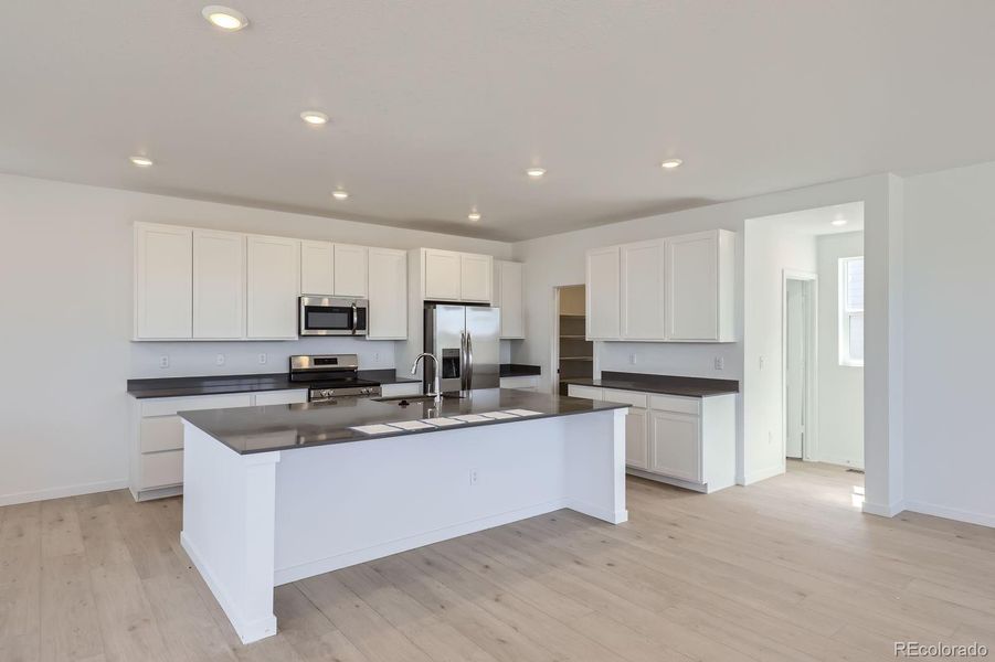 Furnished interior view inside a new home in Parterre: The Skyline Collection, Thornton (Image 7).