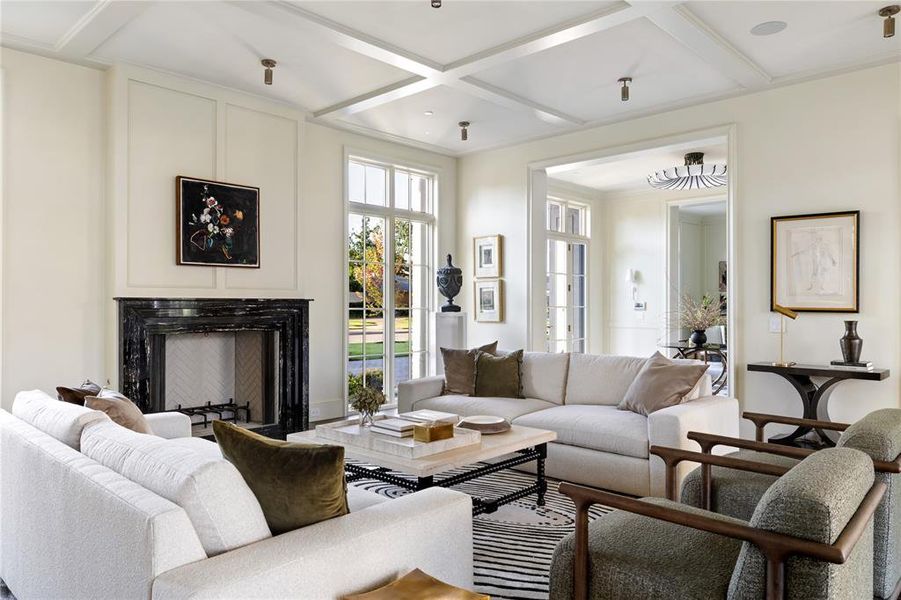 Living room with coffered ceiling and beamed ceiling Living room with coffered ceiling and beamed ceiling