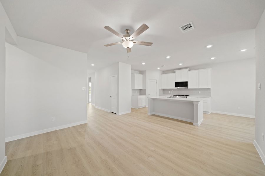 A large empty kitchen. A large empty kitchen.