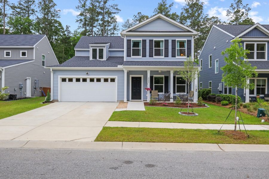 Front exterior of a new home in , Summerville, SC, highlighting curb appeal (Image 24).