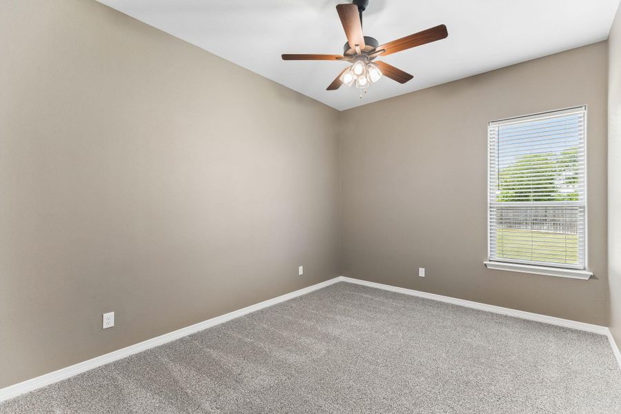 Quiet, comfortable, and filled with natural light, this bedroom offers a welcoming retreat at the end of the day.