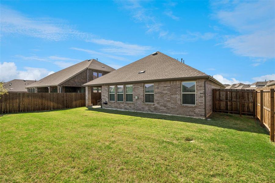 Exterior details and patio area of a home in , Providence Village (Image 21).