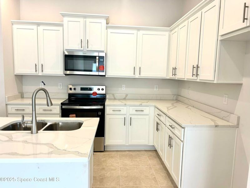 Furnished interior view inside a new home in St. John Preserve, Palm Bay (Image 4). Furnished interior view inside a new home in St. John Preserve, Palm Bay (Image 4).