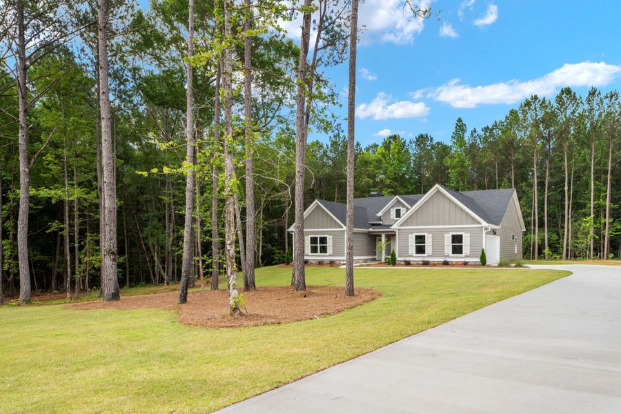 Front exterior of a new home in Flint Farms, Concord, GA, highlighting curb appeal (Image 21).