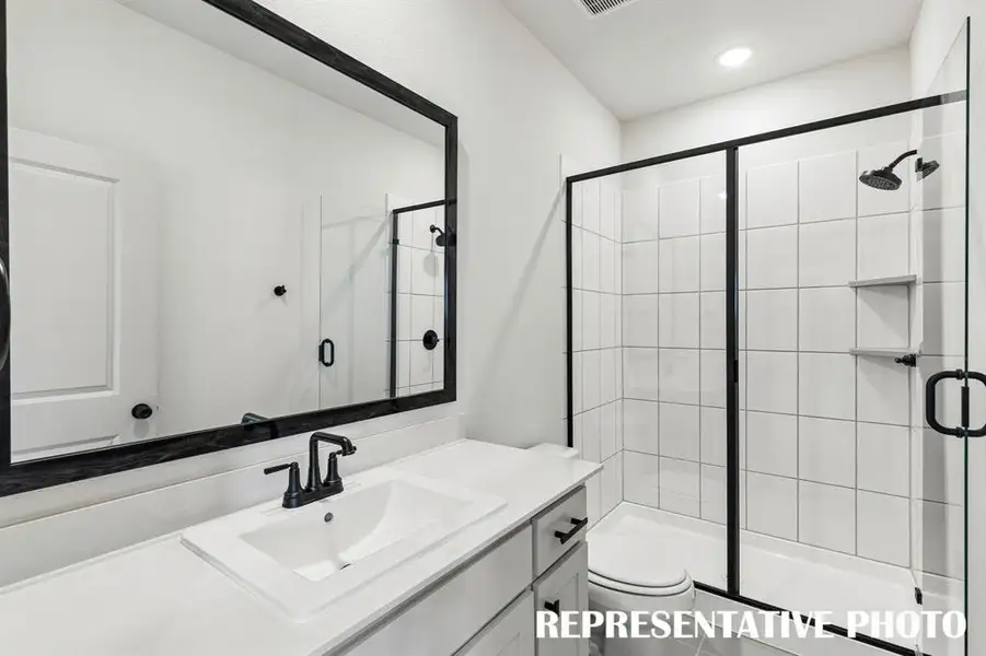 Guests will feel right at home in either of the beautifully finished guest baths in our Montclair plan.  REPRESENTATIVE PHOTO