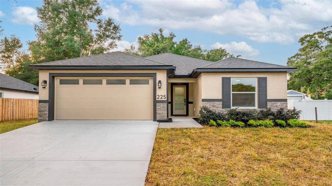 Front exterior of a new home in , Umatilla, FL, highlighting curb appeal (Image 2). Front exterior of a new home in , Umatilla, FL, highlighting curb appeal (Image 2).