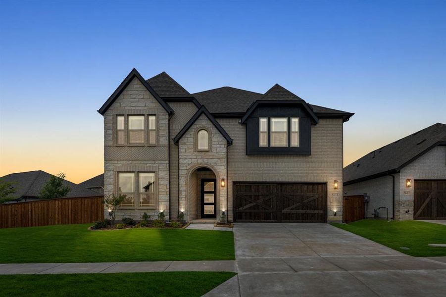 Front exterior of a new home in Willow Wood, McKinney, TX, highlighting curb appeal (Image 2). Front exterior of a new home in Willow Wood, McKinney, TX, highlighting curb appeal (Image 2).