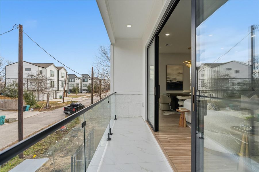 Exterior details and patio area of a home in , Houston (Image 4).