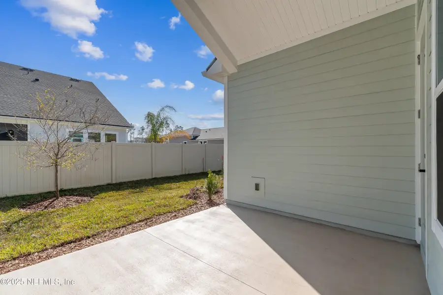 Exterior details and patio area of a home in Crosswinds 40’, Ponte Vedra (Image 3).