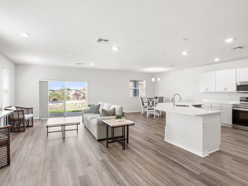 The living space is filled with natural light - Wesley II by Highland Homes