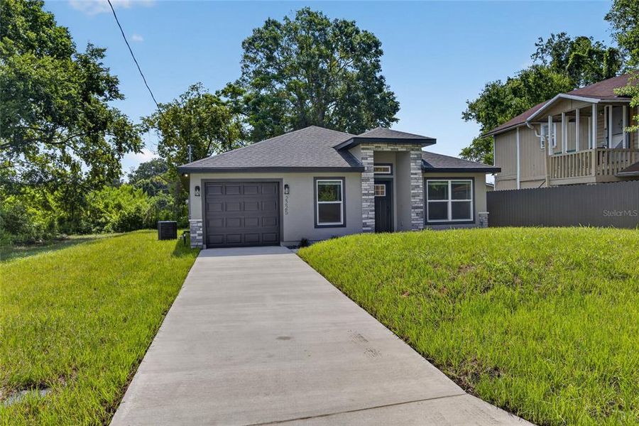 Front exterior of a new home in , Sanford, FL, highlighting curb appeal (Image 25). Front exterior of a new home in , Sanford, FL, highlighting curb appeal (Image 25).