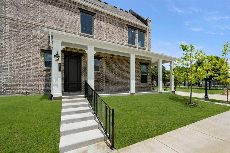 Front exterior of a new home in Parkside, Mansfield, TX, highlighting curb appeal (Image 23). Front exterior of a new home in Parkside, Mansfield, TX, highlighting curb appeal (Image 23).