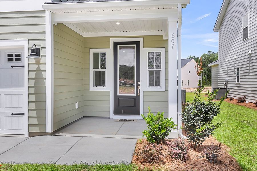 Exterior details and patio area of a home in Pineland Preserve, Summerville (Image 3).