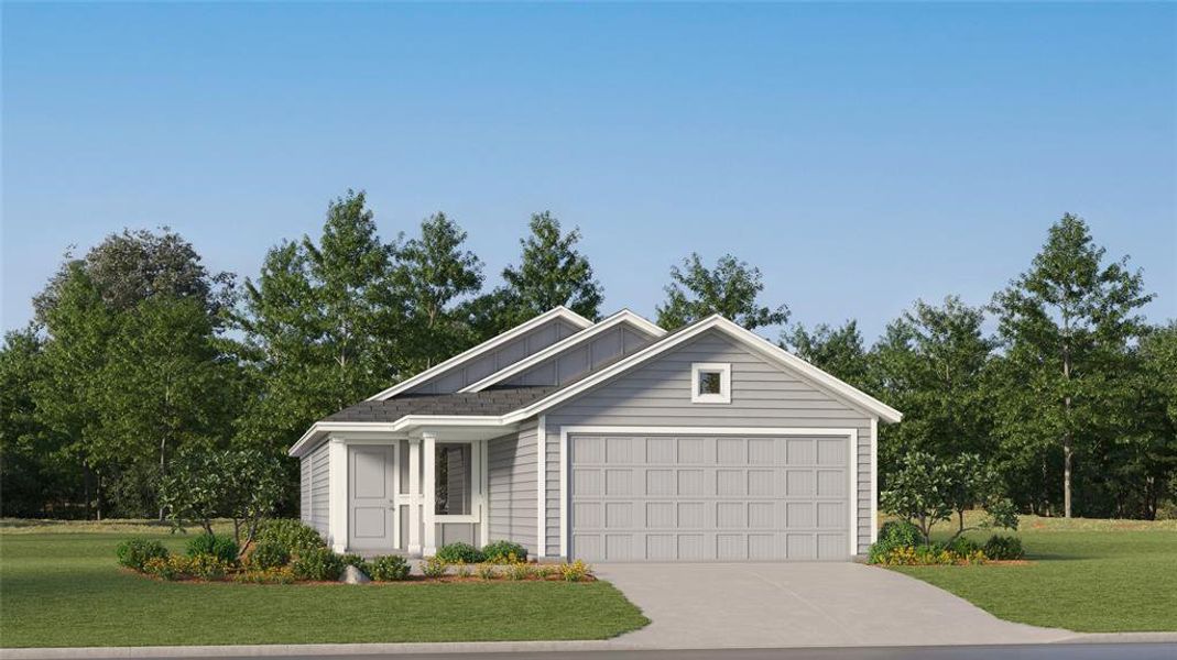 View of front of home featuring a garage and a front yard