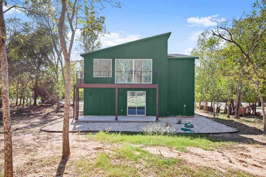 Front exterior of a new home in , Bastrop, TX, highlighting curb appeal (Image 2).
