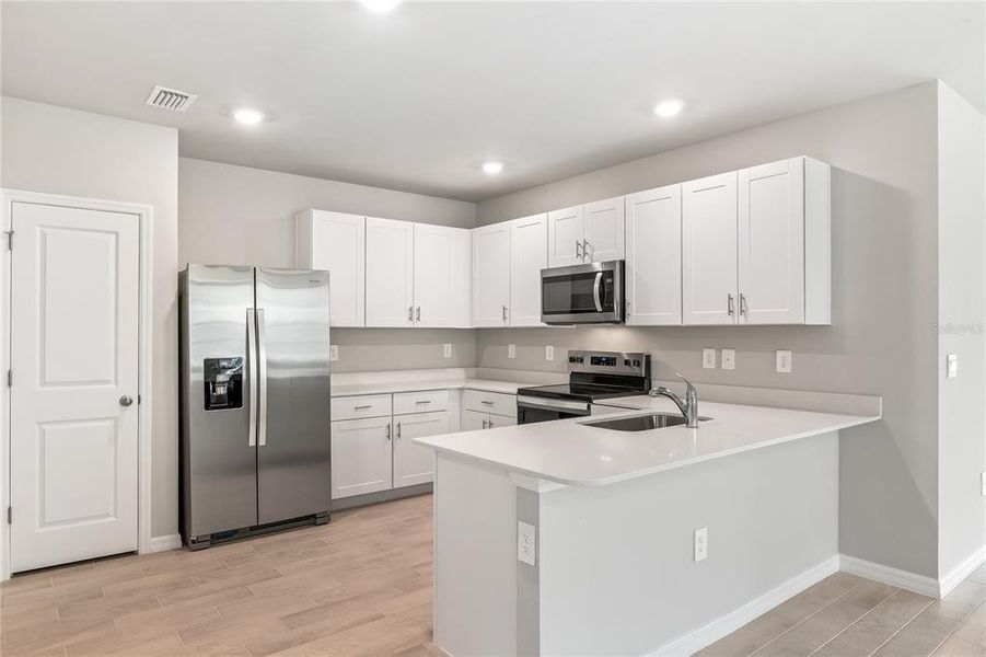 Furnished interior view inside a new home in Heritage Lake Park, Punta Gorda (Image 4). Furnished interior view inside a new home in Heritage Lake Park, Punta Gorda (Image 4).