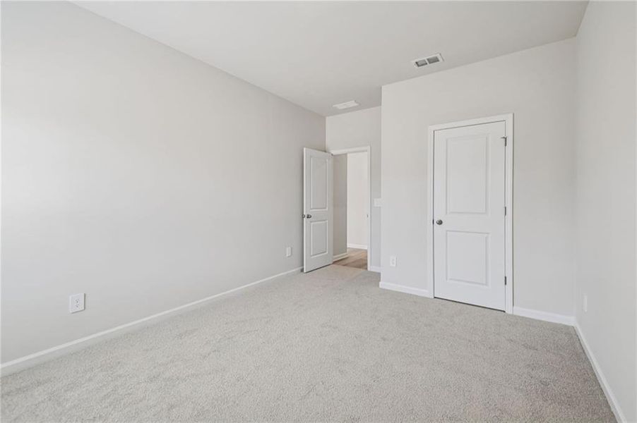 Spacious, unfurnished interior of a new home in Creekside at Oxford Park, Fairburn (Image 49).