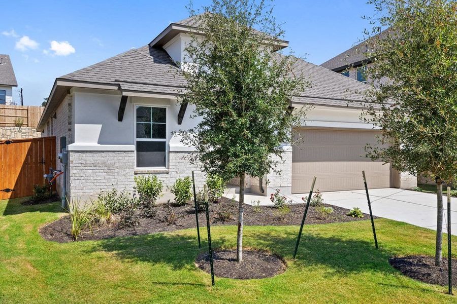 Exterior details and patio area of a home in Lariat, Liberty Hill (Image 3). Exterior details and patio area of a home in Lariat, Liberty Hill (Image 3).