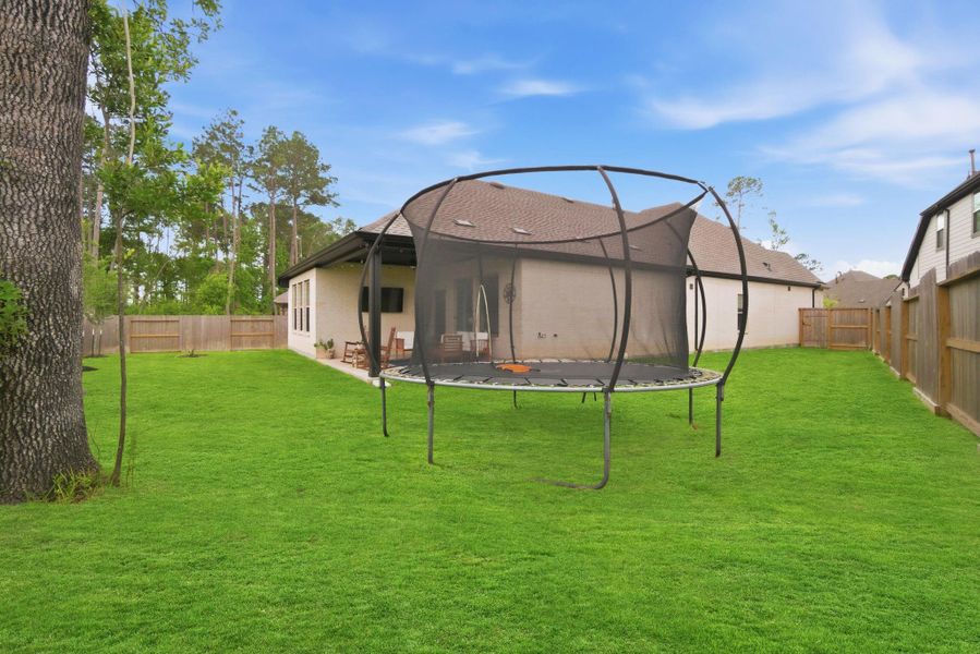 Exterior details and patio area of a home in , Willis (Image 26).