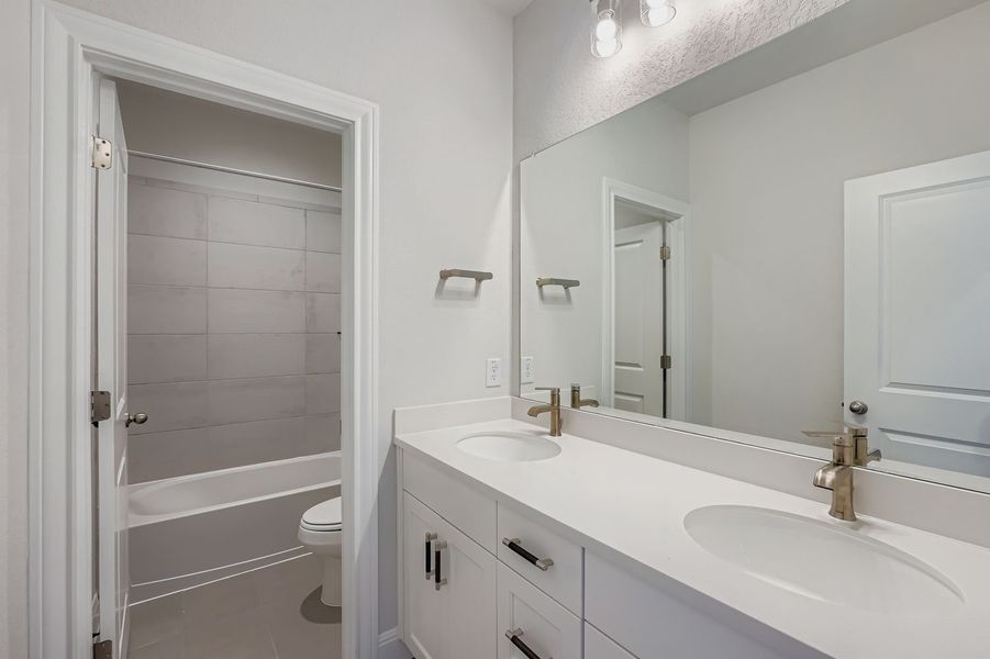 Furnished interior view inside a new home in 6 Creeks, Kyle (Image 5).