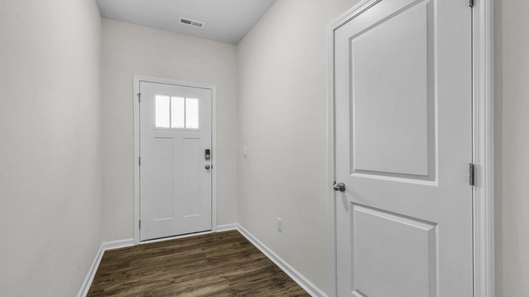 Representative unfurnished interior of a home built from the BOOTH by D.R. Horton in North Gate, Vass (Image 19).