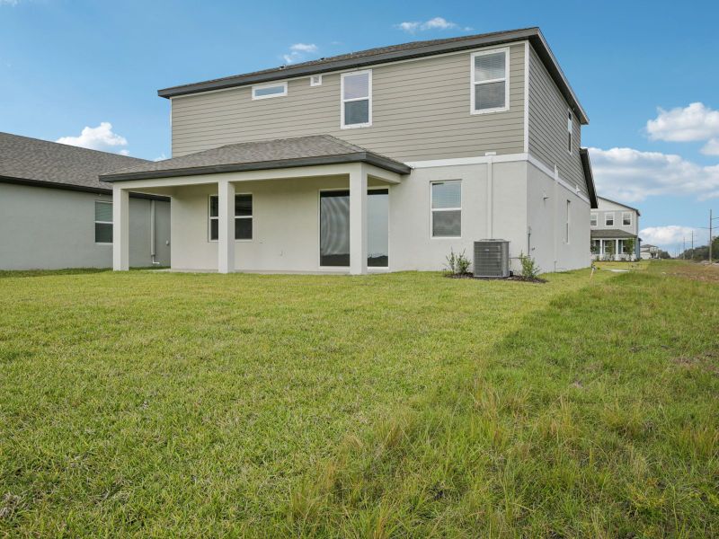 Exterior details and patio area of a home in Coasterra - Reserve Series, Palmetto (Image 3).