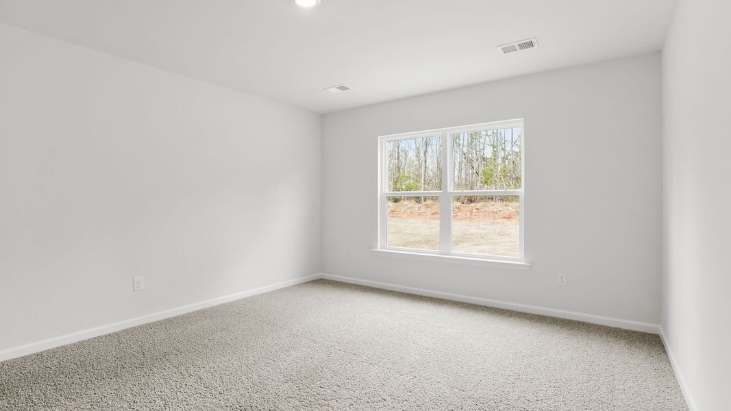 Spacious, unfurnished interior of a new home in Bentley Park, Greenwood (Image 22).