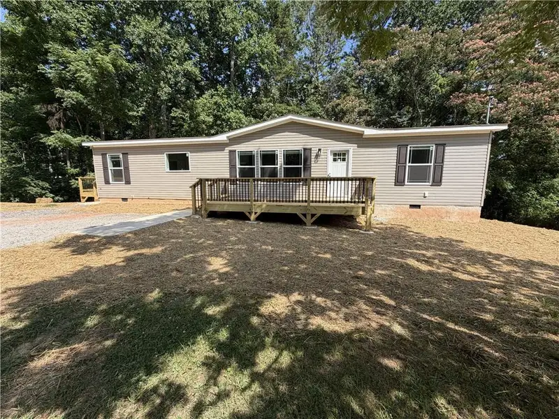 Exterior details and patio area of a home in , Ball Ground (Image 23).