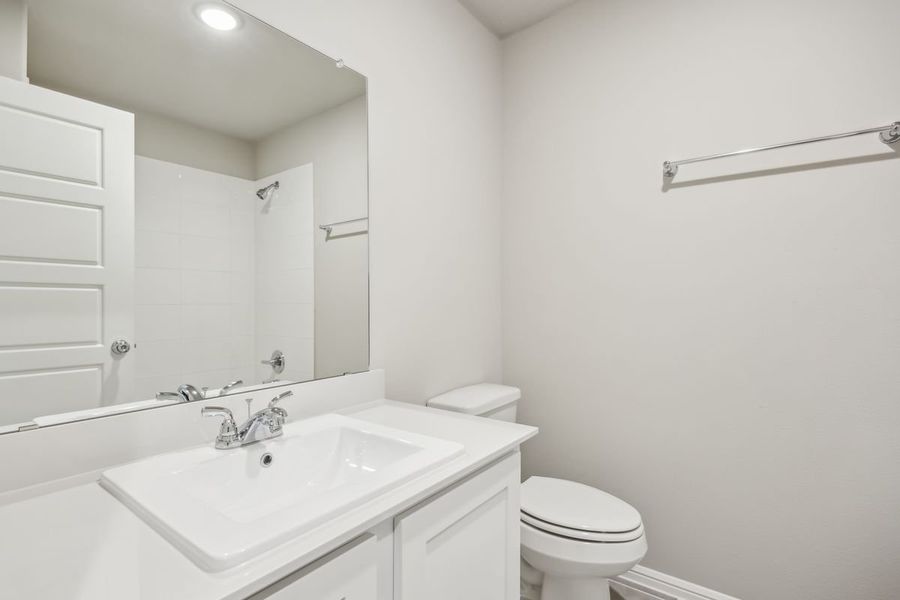 Bathroom in the Sabrina home plan by Trophy Signature Homes – REPRESENTATIVE PHOTO