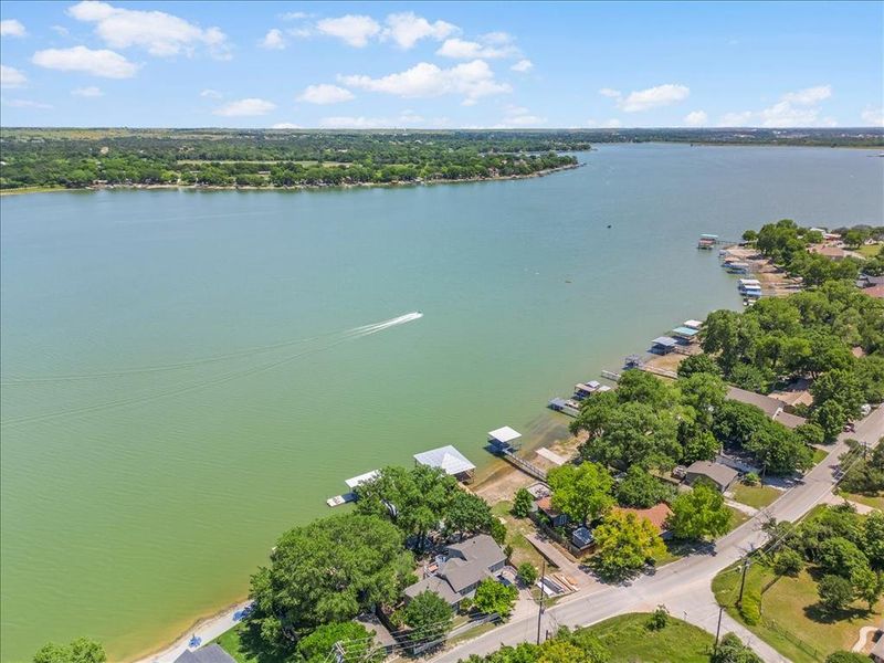 Aerial view of residential area with a nearby body of water
