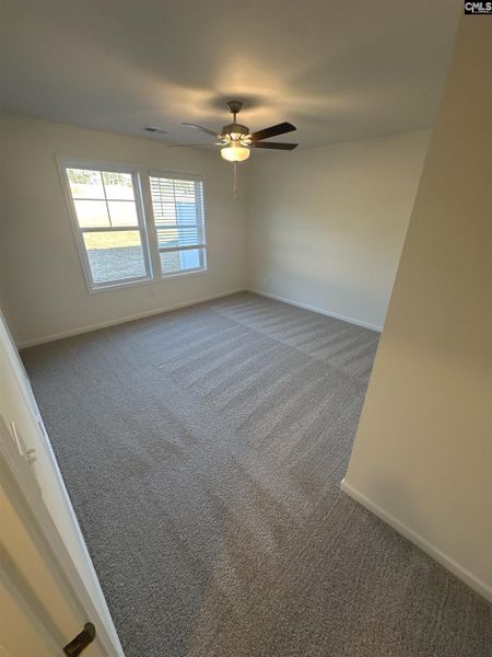 Spacious, unfurnished interior of a new home in Piney Woods Bluff, Columbia (Image 15).