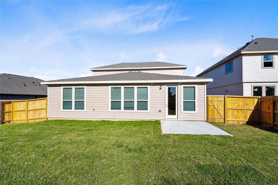 Come and see this spacious backyard. There is plenty of room for the kids to play and adults to relax!