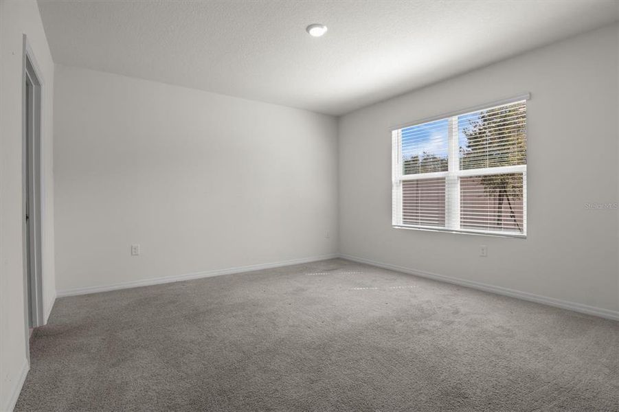 Spacious, unfurnished interior of a new home in Cadence at Parc Hill, Orange City (Image 19).