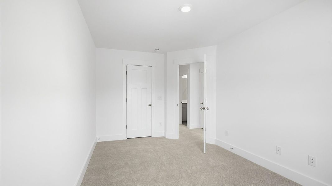 First-class secondary bedroom with comfortable carpeted flooring and generous closet space in Spartanburg, SC First-class secondary bedroom with comfortable carpeted flooring and generous closet space in Spartanburg, SC