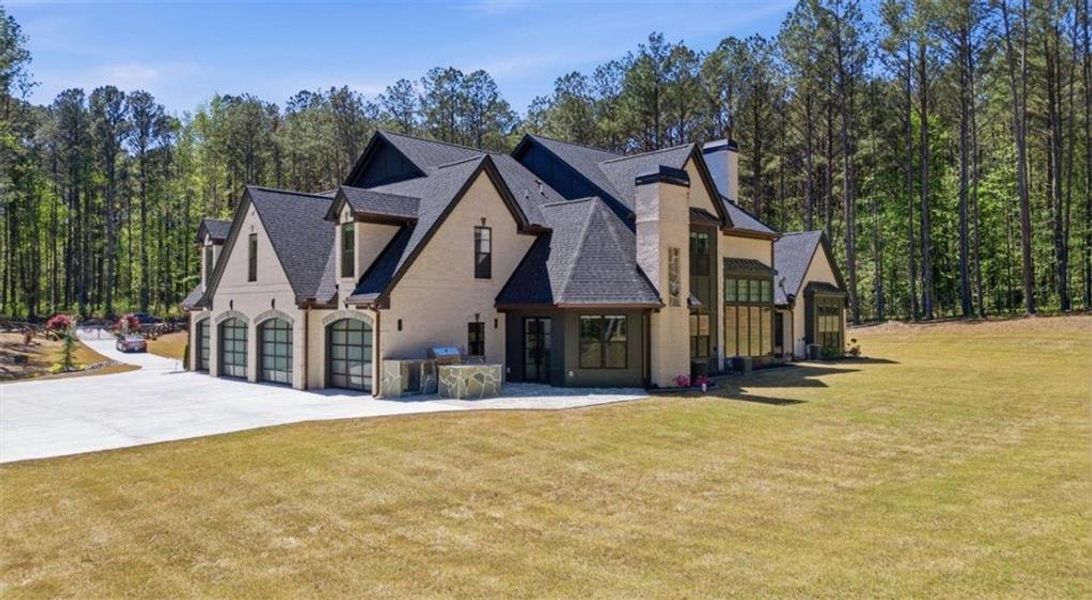 Front exterior of a new home in , Tyrone, GA, highlighting curb appeal (Image 24).