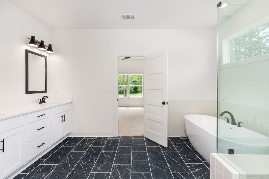 Furnished interior view inside a new home in The Reserve at Reidsboro, Williamson (Image 18).