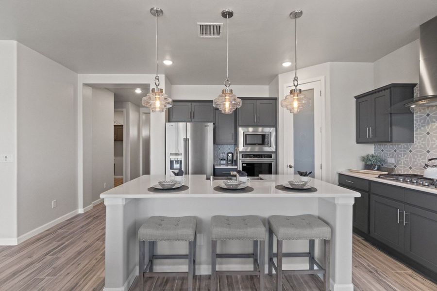Representative furnished interior of a home built from the Valencia by Hakes Brothers in Hillside Park, El Paso (Image 5).