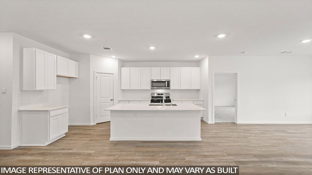 Furnished interior view inside a new home in Sunterra, Katy (Image 6).