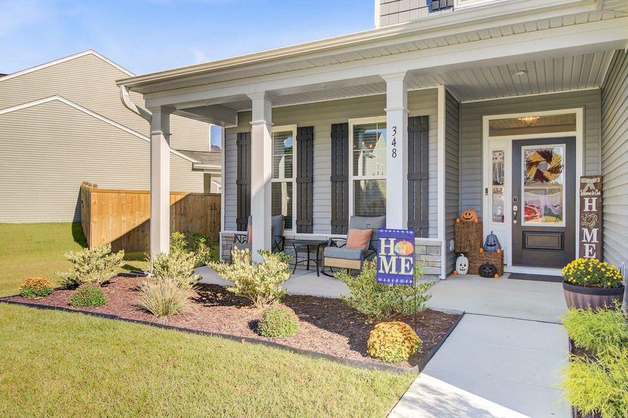 Exterior details and patio area of a home in Oakley Pointe, Moncks Corner (Image 22).