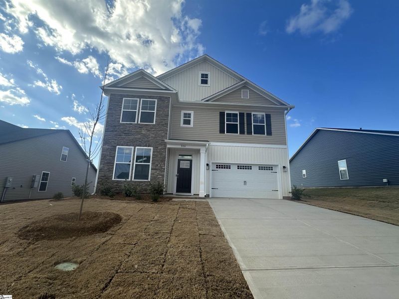 Front exterior of a new home in Shiloh Trail, Wellford, SC, highlighting curb appeal (Image 2).