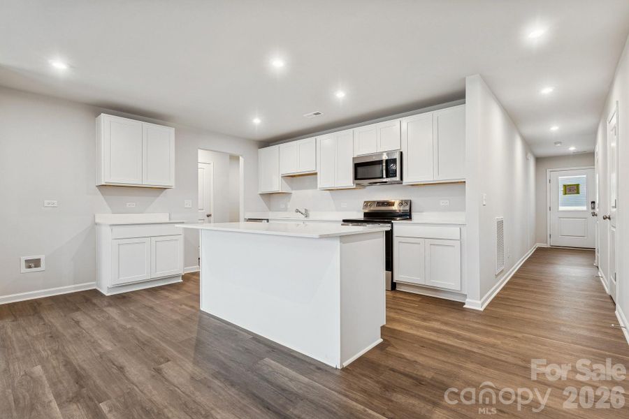 Example Photo Example Photo