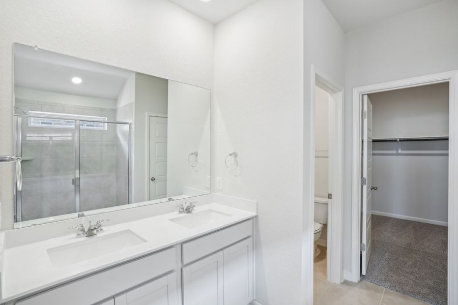 Primary suite bathroom in the Callaghan floorplan at a Meritage Homes community.