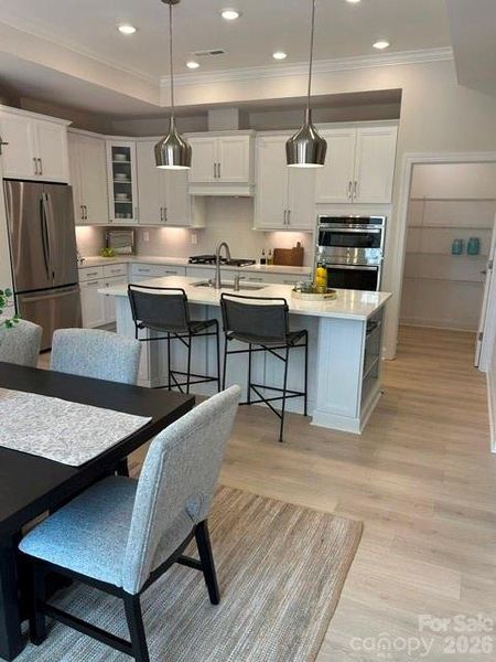 Furnished interior view inside a new home in The Courtyards at Hodges Farm, Charlotte (Image 10).