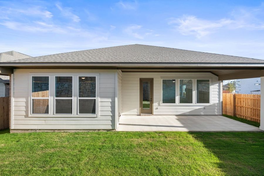 Exterior details and patio area of a home in Park Collection at Lariat, Liberty Hill (Image 26). Exterior details and patio area of a home in Park Collection at Lariat, Liberty Hill (Image 26).