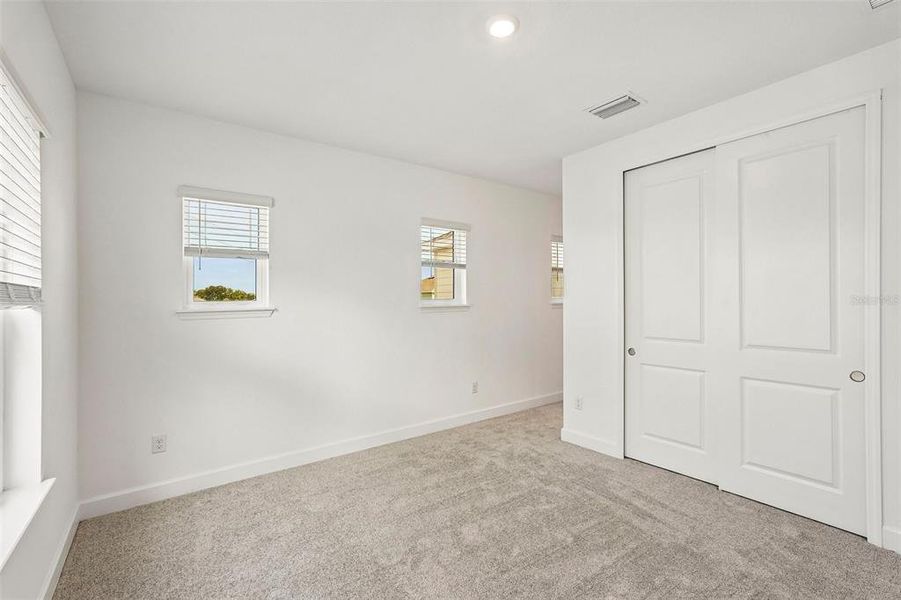Spacious, unfurnished interior of a new home in Tiburon, Nokomis (Image 32).