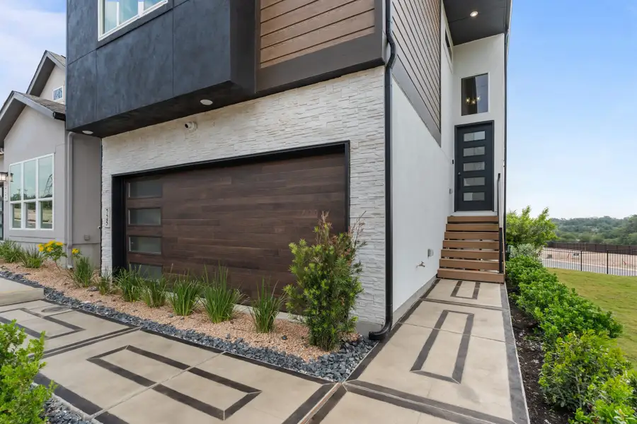 Exterior details and patio area of a home in Centero at Stone Oak, San Antonio (Image 3).