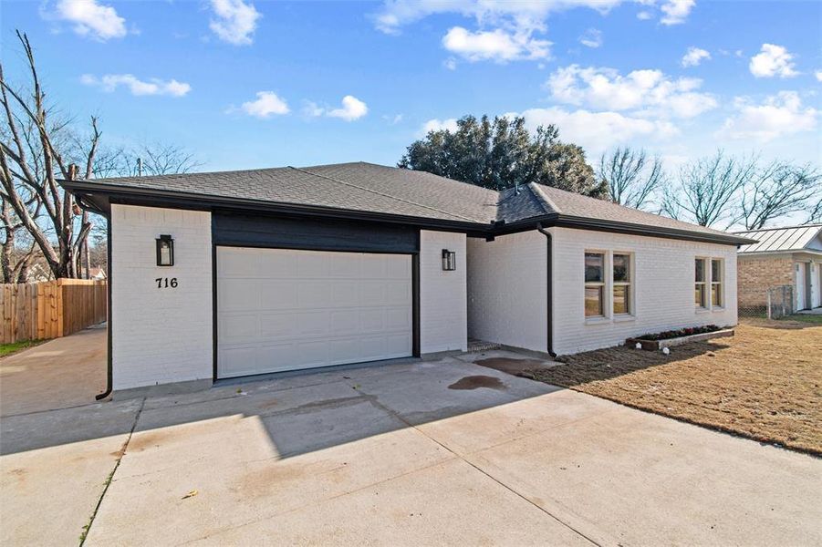 Ranch-style home with a garage