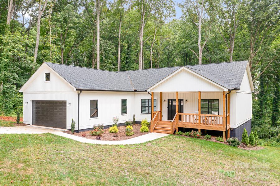 Front exterior of a new home in , Statesville, NC, highlighting curb appeal (Image 25).